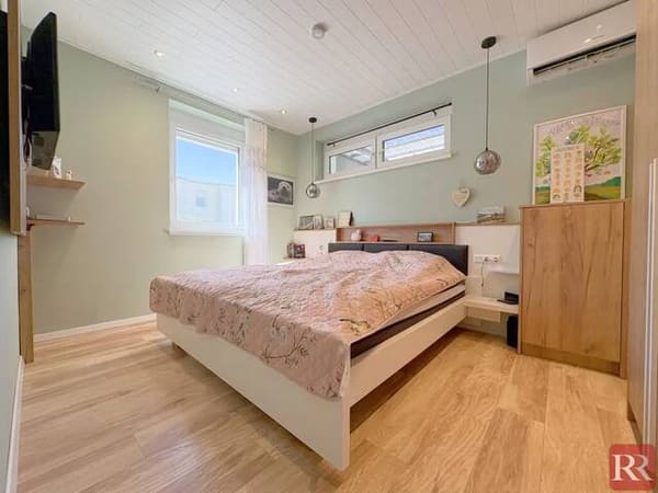 Immobilie in Ebreichsdorf - Moderne Dreizimmerwohnung mit Garten und zwei Parkplätzen, Badebiotop - Bild 2