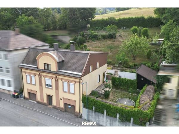 Immobilie in Traisen - Großzügiges Zuhause mit zwei Wohneinheiten, Garten und Garagen - Bild 3