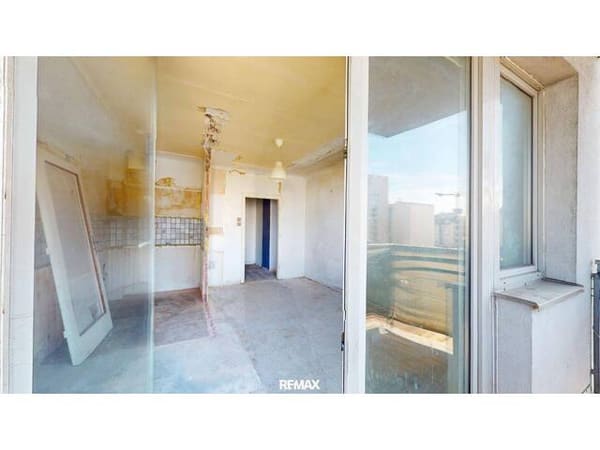 Immobilie in Wien - Sanierungsbedürftige 2-Zimmer-Balkon-Wohnung in U1-Nähe - Bild 2