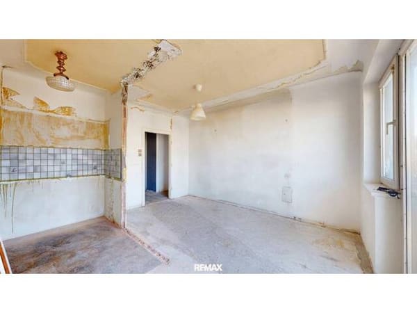 Immobilie in Wien - Sanierungsbedürftige 2-Zimmer-Balkon-Wohnung in U1-Nähe - Bild 4