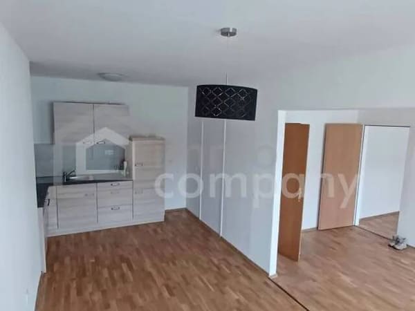 Immobilie in Frohsdorf - Vermietete 2-Zimmer-Eigentumswohnung mit Parkplatz und Kellerabteil - Bild 1