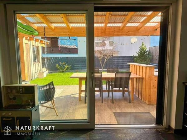 Immobilie in Telfs - Ein Zuhause zum Ankommen – Haushälfte mit Traumterrasse, Garten & nachhaltigem Energiekonzept - Bild 1