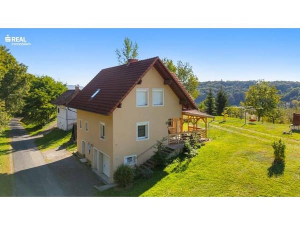 Immobilie in Bad Gleichenberg - Modernes Einfamilienhaus in Trautmannsdorf mit Panoramablick und viel Grünfläche - Bild 0