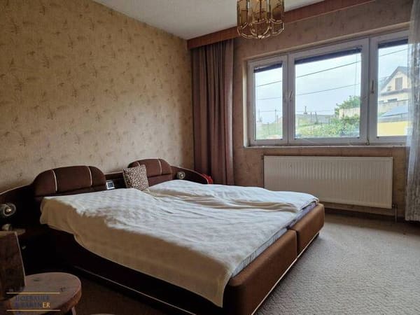 Immobilie in Hausbrunn - Sanierungsbedürftiges Einfamilienhaus mit Entwicklungspotenzial in Hausbrunn - Bild 4