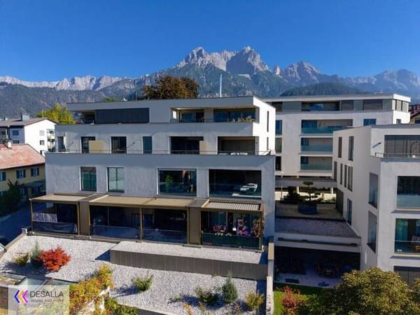 Immobilie in Saalfelden am Steinernen Meer - Moderne Wohnung in zentraler Lage mit Tiefgarage Terrasse und Bergblick mitten im Zentrum - Baujahr 2021 - Bild 0