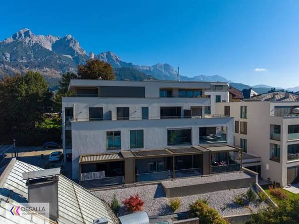 Immobilie in Saalfelden am Steinernen Meer - Moderne Wohnung in zentraler Lage mit Tiefgarage Terrasse und Bergblick mitten im Zentrum - Baujahr 2021 - Bild 1