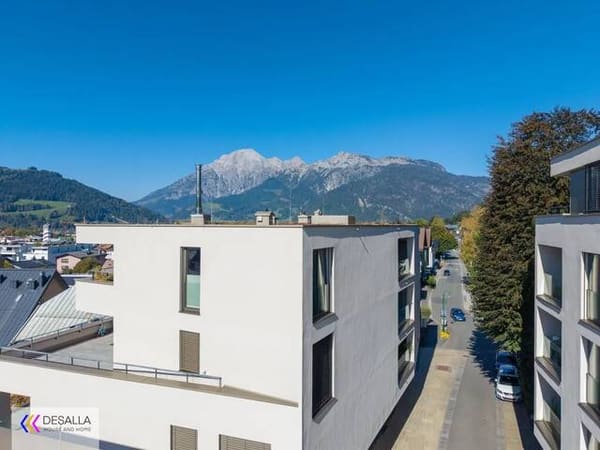 Immobilie in Saalfelden am Steinernen Meer - Moderne Wohnung in zentraler Lage mit Tiefgarage Terrasse und Bergblick mitten im Zentrum - Baujahr 2021 - Bild 2