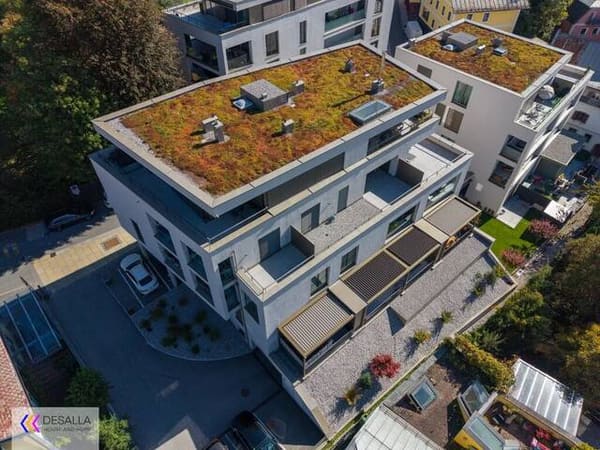 Immobilie in Saalfelden am Steinernen Meer - Moderne Wohnung in zentraler Lage mit Tiefgarage Terrasse und Bergblick mitten im Zentrum - Baujahr 2021 - Bild 3
