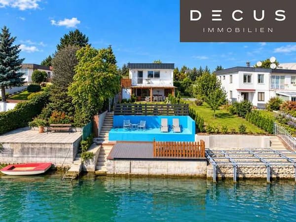Immobilie in Groß-Enzersdorf - EINFAMILIENHAUS DIREKT AM WASSER | EIGENGRUND | ca. 101 m² Fläche | Eigener Garten | Renovierungsbedürftig | Großes Potenzial - Bild 0