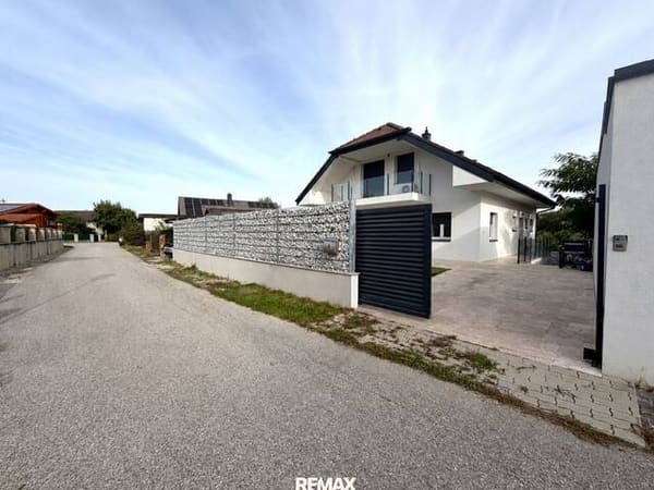 Immobilie in Pöttsching - Wohnen wie im Urlaub - Pool, Natur & Seegenuss - Bild 1