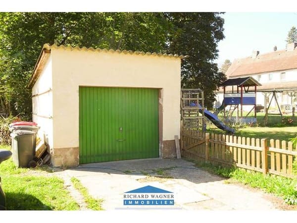 Immobilie in St. Valentin - Eigentumswohnung im Erdgeschoss mit großem Garten, Pool und Garage - Bild 3