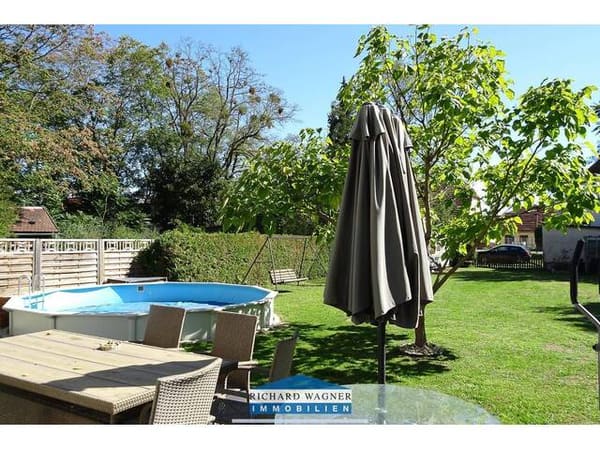 Immobilie in St. Valentin - Eigentumswohnung im Erdgeschoss mit großem Garten, Pool und Garage - Bild 4