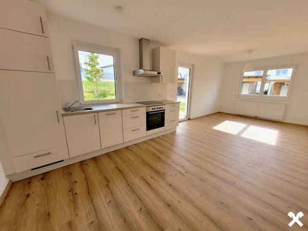 Immobilie in Adlwang - Charmante Gartenwohnung mit Carport und zusätzlichem PKW-Stellplatz - Bild 1
