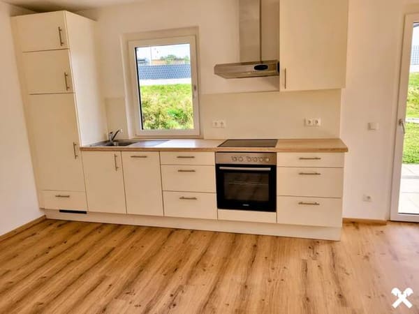 Immobilie in Adlwang - Charmante Gartenwohnung mit Carport und zusätzlichem PKW-Stellplatz - Bild 2