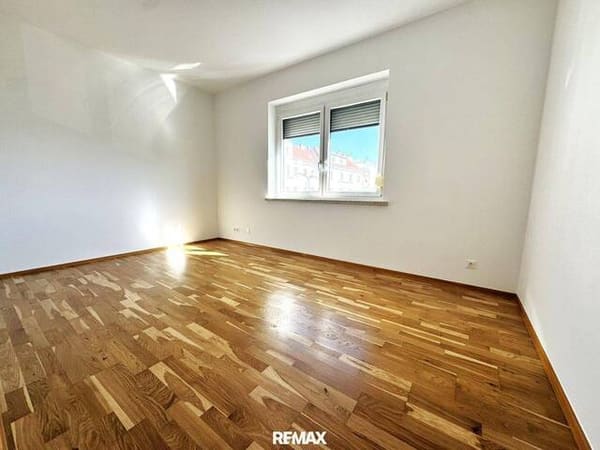 Immobilie in Eisenstadt - Moderne 3 Zimmer Wohnung in Eisenstadt mit Balkon, Parkplatz, Fußbodenheizung – TOP Lage! - Bild 2