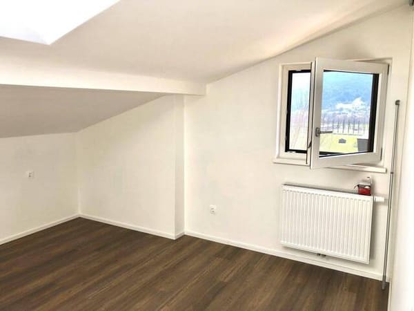 Immobilie in Telfs - Moderne 3-Zi-Dachgeschoßwohnung mit Balkon, 2 Stellplätzen und tollen Ausblick - Bild 4