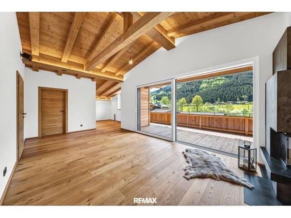 Immobilie in Aurach bei Kitzbühel - Erstbezug - Luxuriöses Penthouse mit privatem Lift, offenem Wohnbereich und Panoramablick in sonniger Toplage - Bild 2