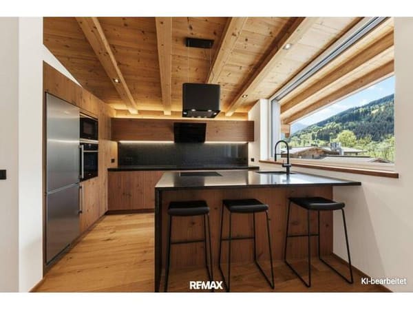 Immobilie in Aurach bei Kitzbühel - Erstbezug - Luxuriöses Penthouse mit privatem Lift, offenem Wohnbereich und Panoramablick in sonniger Toplage - Bild 4