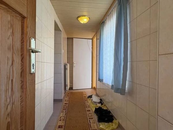 Immobilie in Hausbrunn - Charmantes Haus in Hausbrunn mit Garten, Parkplatz und Renovierungspotenzial! - Bild 3