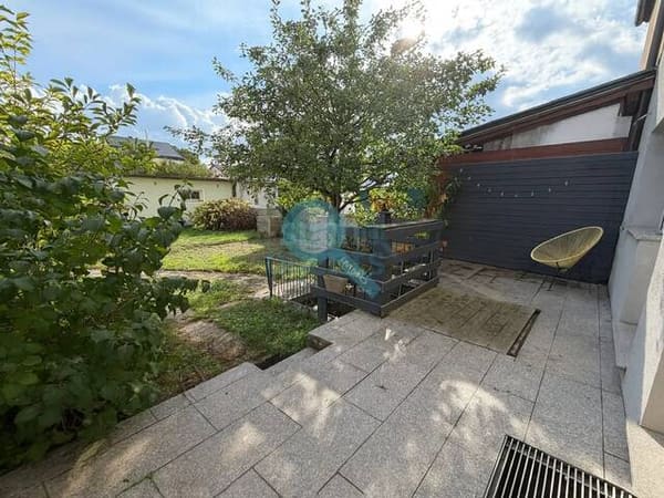 Immobilie in Wels - Wels Stadt - Reihenhaus mit Garten und Garage in ruhiger Top-Lage - Bild 1