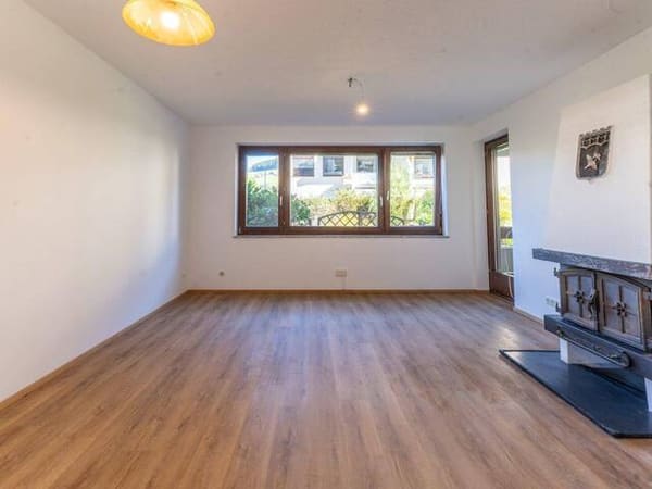 Immobilie in Bischofshofen - RUHEPOL | 3-Zimmer-Wohnung mit Kaminofen, Balkon & Tiefgarage - Bild 3