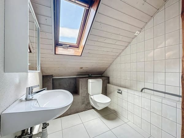Immobilie in Yverdon-les-bains - IL OCCUPE TOUTE LA TOITURE DE L'IMMEUBLE ?VOTRE COCON SOUS LES TOITS FACE À LA THIELLE - Bild 15