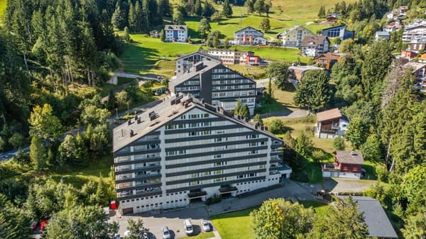 Immobilie in Flumserberg Tannenheim - 1.5-Zimmer-Studio-Ferienwohnung mit Gartensitzplatz und Tiefgaragenplatz - Bild 1
