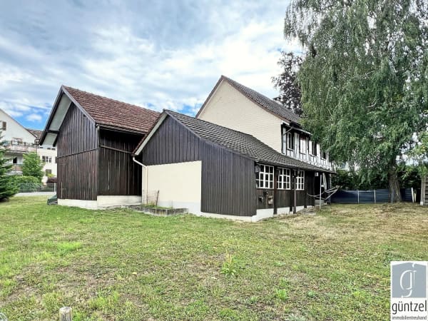 Immobilie in Hefenhofen - Einfamilienhaus mit zwei Schopfbauten und Baulandreserve - Bild 2