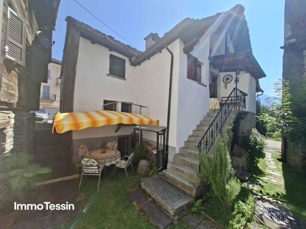 Immobilie in Chironico - GemÃ¼tliches & liebevoll ausgebautes Tessiner Refugium, Doppel-Einfamilienhaus mit Grottino, Werkstatt und CheminÃ©e - Bild 2