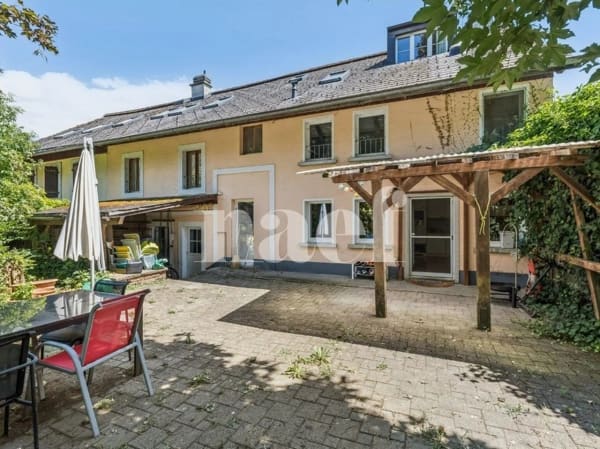 Immobilie in Sorens - Maison jumelée de 6.5 pièces avec jardin à vendre à Sorens - Bild 1
