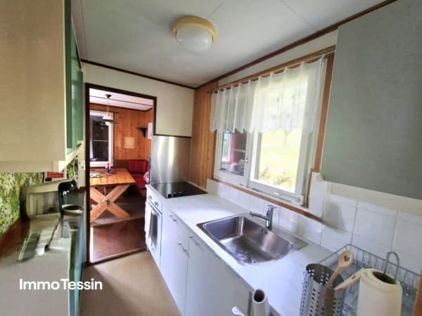 Immobilie in Corzoneso - Gemütliches Tessiner Rustico an ruhiger Lage mit fantastischer Berg und Talsicht ins Bleniotal - Bild 9