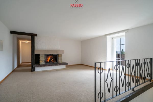 Immobilie in Les Prés-d'orvin - Charmante 4.5-Zimmer-Wohnung mit Cheminée und Alpenblick - Bild 0
