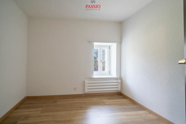 Immobilie in Les Prés-d'orvin - Charmante 4.5-Zimmer-Wohnung mit Cheminée und Alpenblick - Bild 11