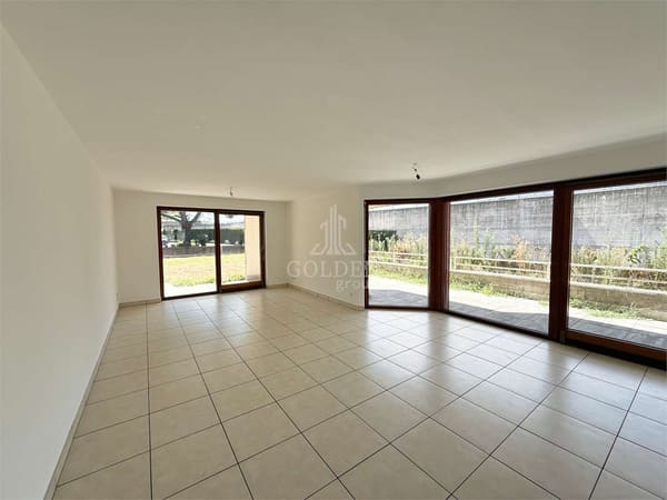 Immobilie in Vezia - Ampio 4.5 locali con giardino privato e terrazza coperta - Bild 1