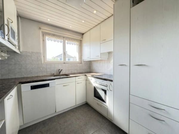 Immobilie in Hilterfingen - Charmantes Einfamilienhaus am Bach mit Wintergarten und Garage - Bild 4