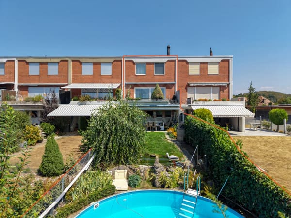 Immobilie in Wünnewil - Ruhiges 6-Zimmer-Reiheneinfamilienhaus mit Pool & Garage in Wünnewil - Bild 0