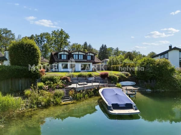 Immobilie in Lachen Sz - Wohnen direkt am Wasser: Einfamilienhaus mit privatem Bootssteg und Badeplatz - Bild 0