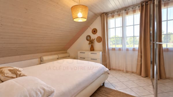 Immobilie in Hauterive Ne - Maison individuelle 5.5 pièces rénovée avec piscine, photovoltaïque et 4 places de parc - Bild 12