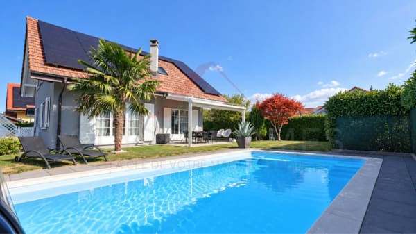 Immobilie in Hauterive Ne - Maison individuelle 5.5 pièces rénovée avec piscine, photovoltaïque et 4 places de parc - Bild 3