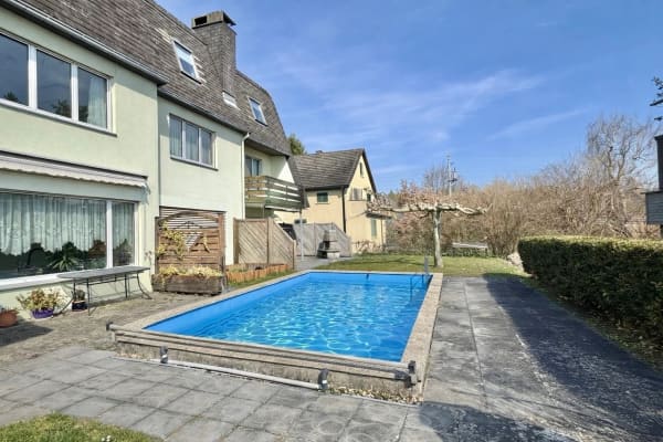 Immobilie in Dachsen - Einfamilienhaus-HÃ¤lfte mit Gemeinschaftspool - Bild 1