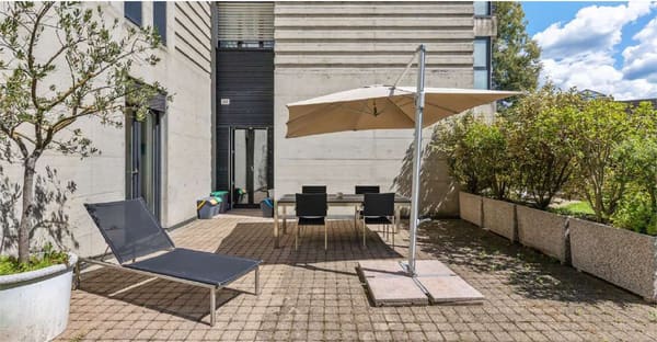 Immobilie in Porza - elegante appartamento 3,5 locali con ampio giardino - Bild 12