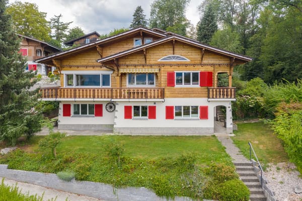 Immobilie in Meierskappel - 2-Familien Chalet mit 6.5 bis 7.5 und 2.5-Zimmer Wohnung, teils mit Seesicht - Bild 0