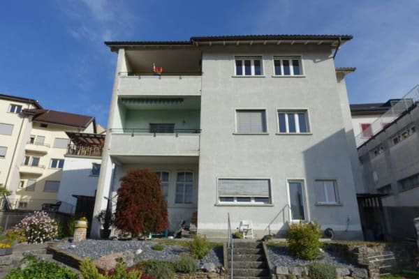 Immobilie in Tramelan - Tramelan - Maison de 2 appartements et atelier, annexe et places de parc, au centre de la localitÃ© - Bild 0