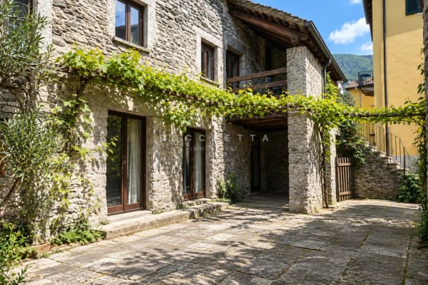 Immobilie in Tegna - Caratteristica casa ticinese con piazzetta privata - Bild 1
