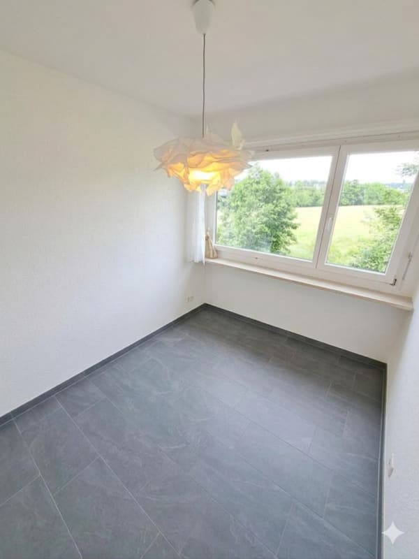 Immobilie in Therwil - Charmante 4.5-Zimmer-Wohnung mit Balkon und schÃ¶ner Aussicht in Therwil - Bild 2