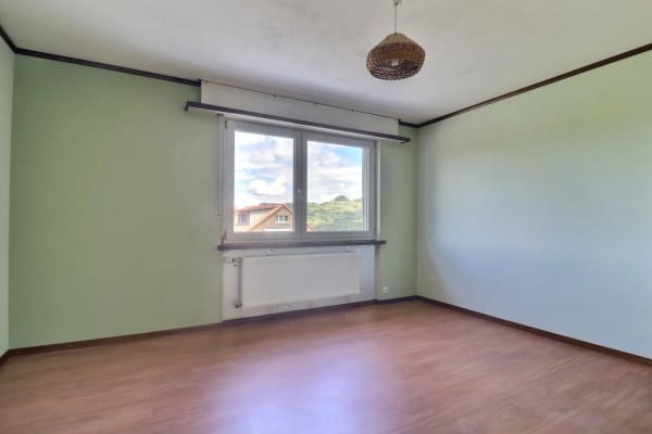 Immobilie in Schwarzsee - Charmante 4,5-Zimmer-Stockwerkeigentumswohnung mit Balkon und Garage - Bild 9