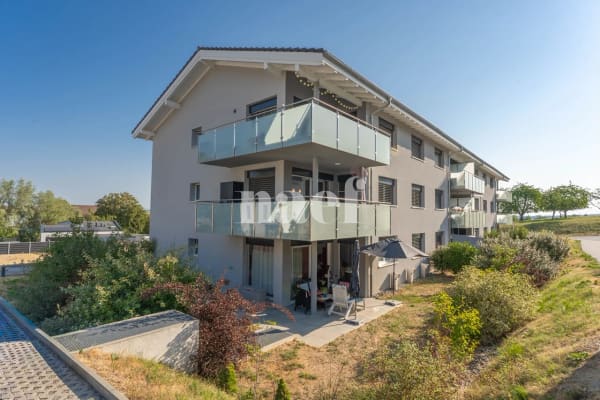 Immobilie in Prez-vers-noréaz - Appartement de 4.5 pièces au rez-de-chaussée avec terrasse et jardin à vendre à Prez-vers-Noréaz - Bild 0