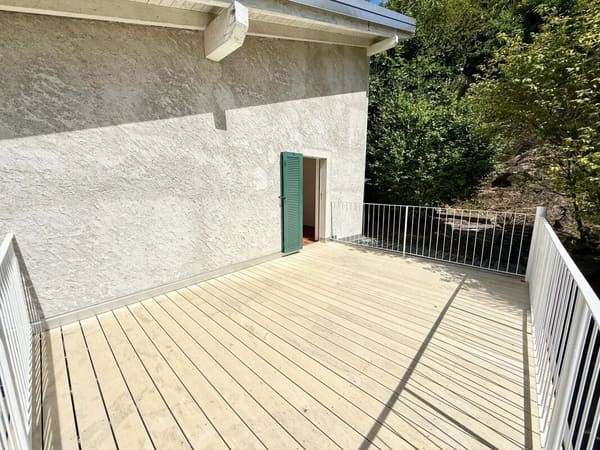 Immobilie in Cugnasco - Zweifamilienhaus mit 5.5-Zimmer-Wohnung + 2-Zimmer-Wohnung, grossem PrivatgrundstÃ¼ck, 4 ParkplÃ¤tzen und Solarpanels - Bild 5
