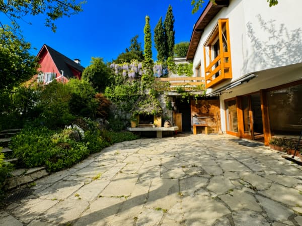 Immobilie in Dornach - GrosszÃ¼giges EFH mit 2 Einliegerwohnungen, ParkplÃ¤tzen, Weitsicht & Garten in Toplage - Bild 1
