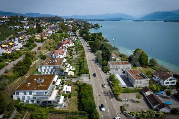 Immobilie in Uerikon - Elegante 5.5-Zimmer-Terrassenwohnung nur wenige Schritte vom Zürichsee entfernt zu kaufen! - Bild 1